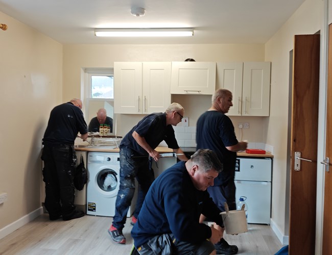 Polygon technicians working 